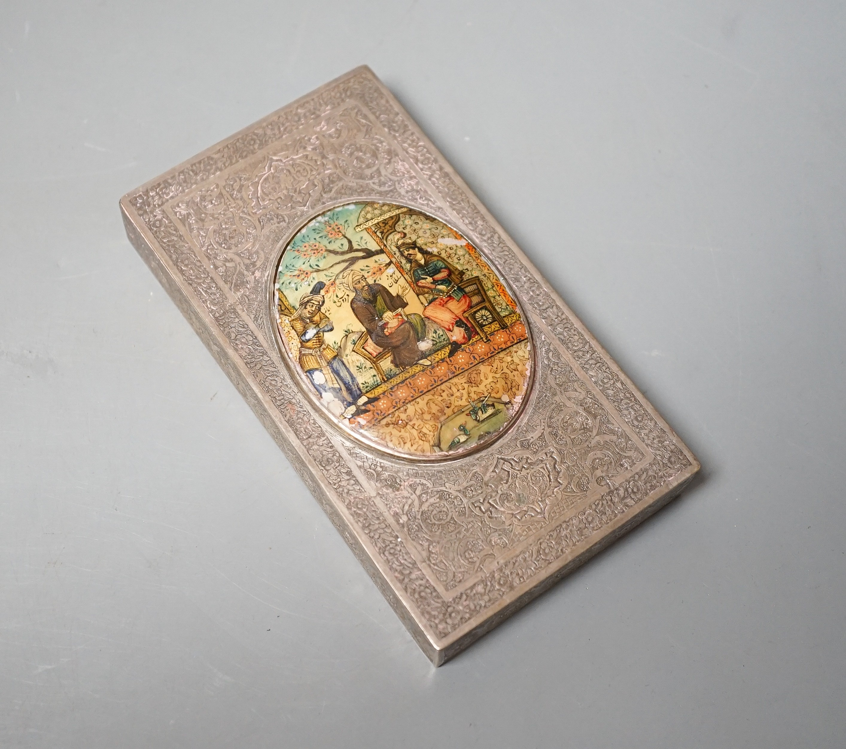 A Persian white metal box with inset miniature lid, 13.8cm.